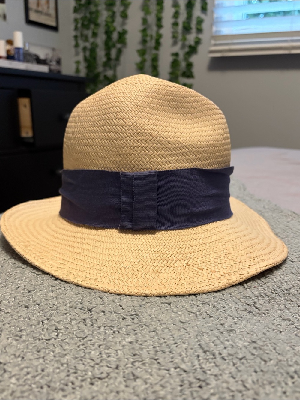 Straw Hat With A Navy Band Detail